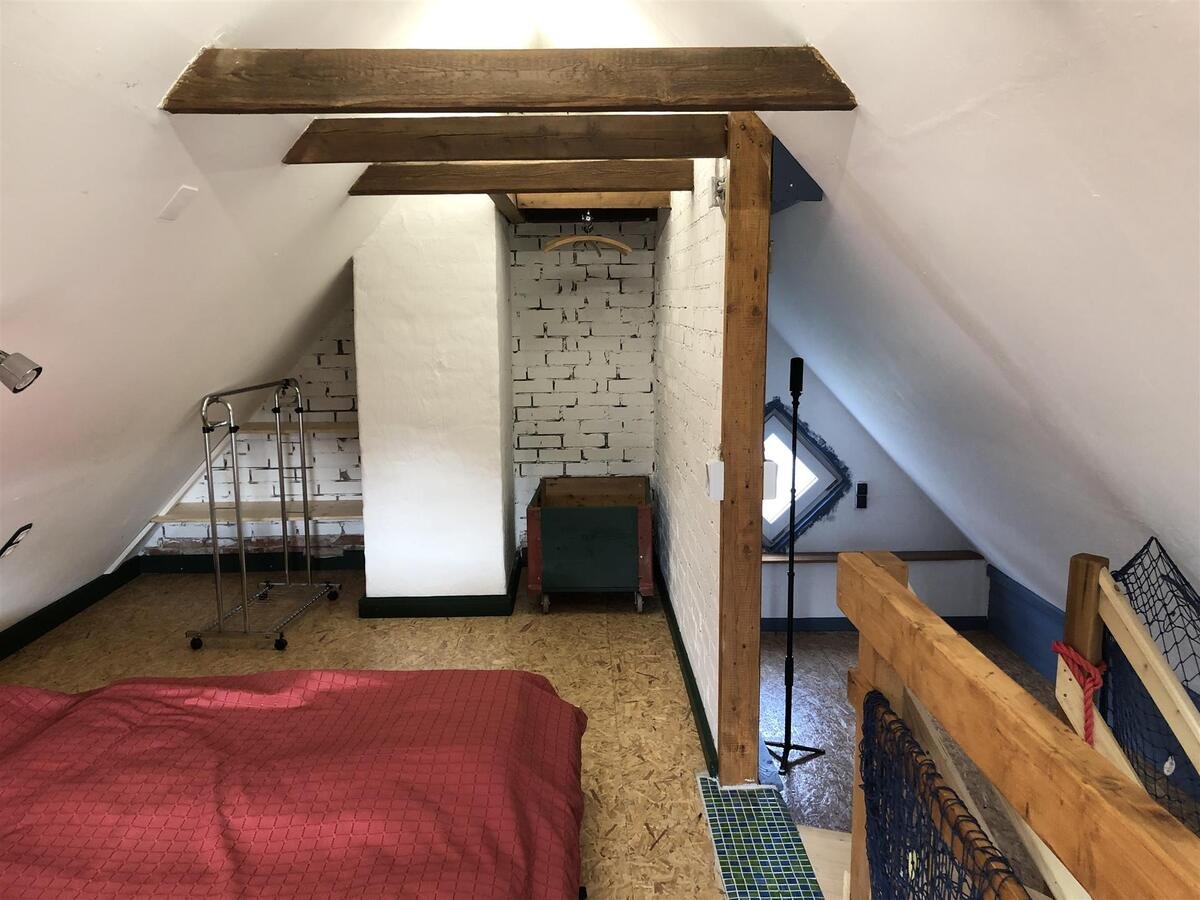 Schlafzimmer im Dachgeschoss des Nebengebäudes 